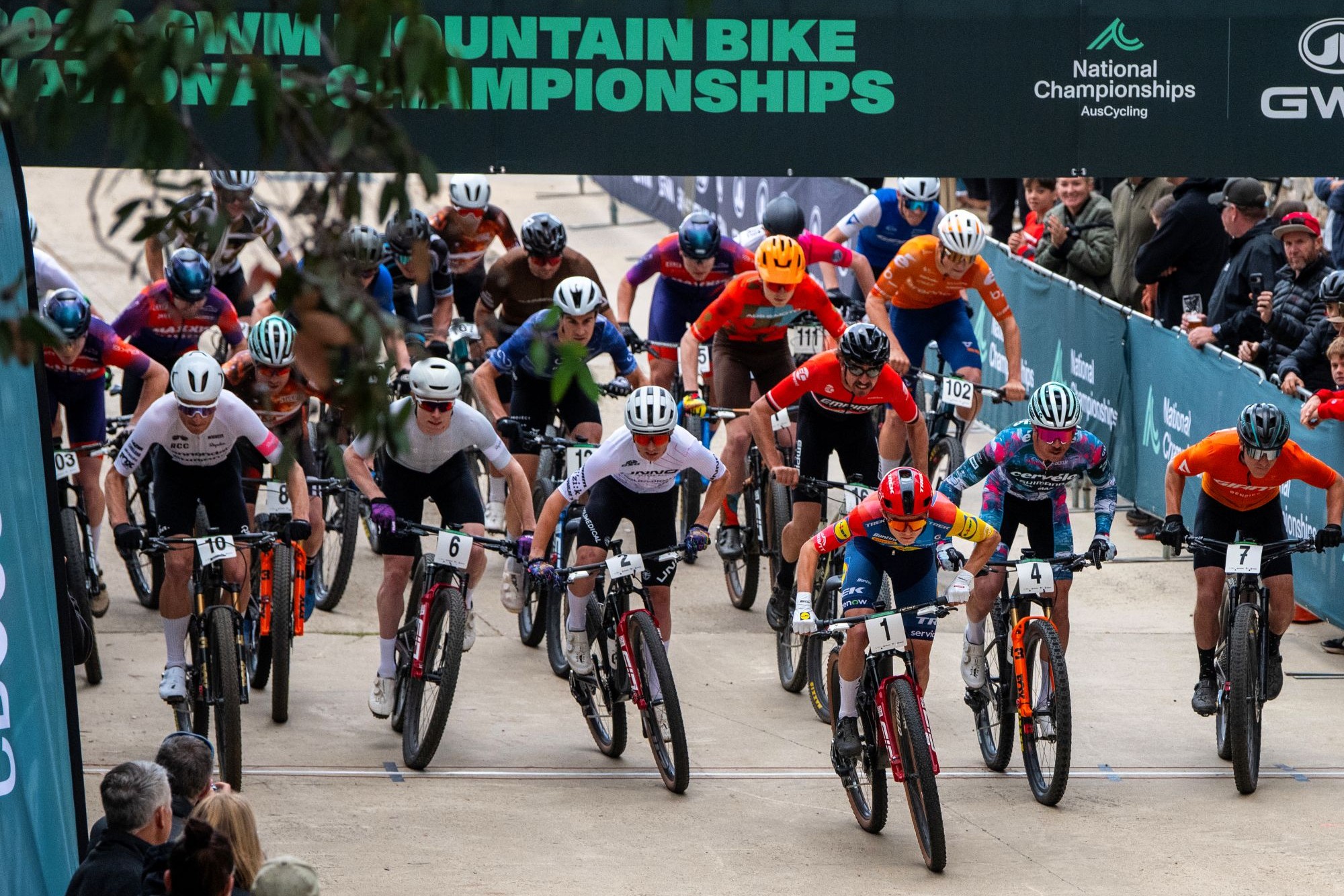 A mass start of a cross-country race at the AusCycling Mountain Bike National Championships